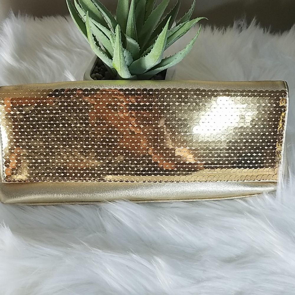 NWOT, Fashion Clutch, gold sequined, flap closure.